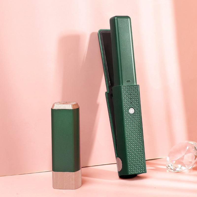 lisseur sans fil GLISSYA™ en version vert posé sur une coiffeuse